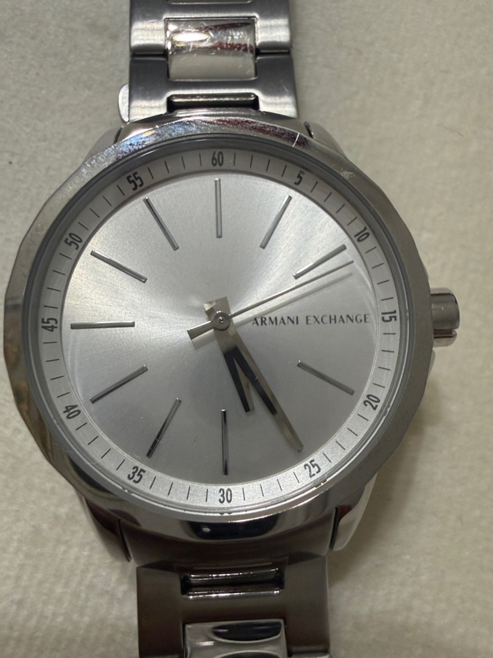 Armani Exchange Woman’s Silver Stainless Steel Bracelet Watch with Sunburst Dial